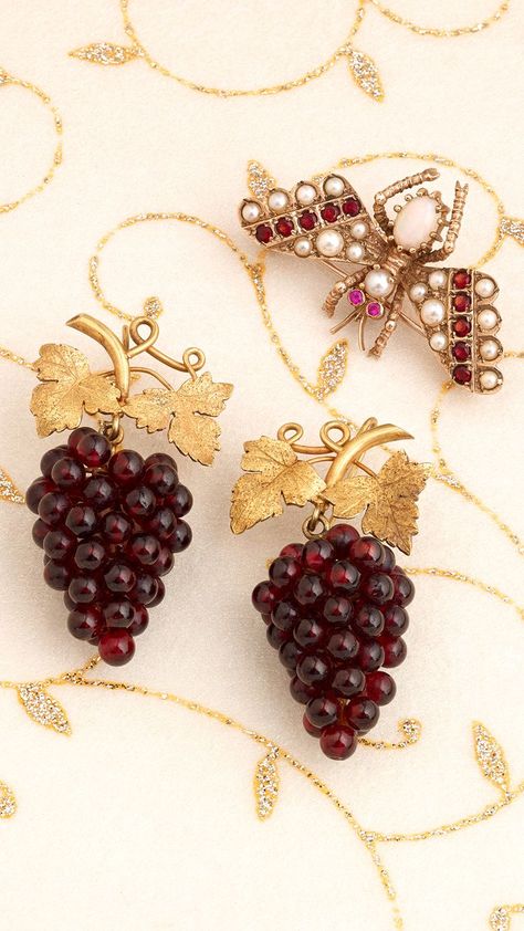 A mid 20th 9ct gold multi-gem butterfly brooch and a pair of late 19th century archaeological revival gold garnet drop earrings, designed as a bunch of grapes. Garnet Drop Earrings, Bunch Of Grapes, Art Wire, Grape Bunch, Jewelry Auction, Wire Sculpture, Butterfly Brooch, Wire Art, How Beautiful