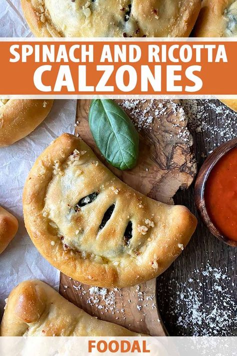 Want to play with pizza dough? Make our spinach ricotta calzones. These meatless half-moons filled with a creamy cheese mixture and fresh spinach are brushed with garlicky parmesan butter after baking. They’re perfect for a casual party or a fun family dinner. Read more now. #spinachcalzone #pizzadough #foodal Garlic Parmesan Butter, Calzones Recipe, Parmesan Butter, Calzone Recipe, Spinach Ricotta, Half Moons, Fresh Spinach, Spinach Stuffed Mushrooms, Spinach And Cheese