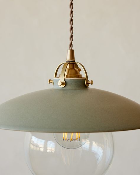 Lostine is delighted to introduce a new addition to our Edmund collection in ceramic. The Edmund Pendant with its distinctive shape and charming details make it one of our most sought after designs. Handmade in our Philadelphia ceramics studio, the ceramic shade, oversized clear globe and the delicate cut brass fitters create a playful silhouette that is well-suited to any room. Hang one solo in a corner reading nook or line them up over your counter for the kitchen update of your dreams. Choose Corner Reading Nook, Ceramic Pendant Light, Ceramics Studio, Candle Mirror, Metal Canopy, Ceramic Candle Holders, Kitchen Pendants, Ceramic Candle, Ceramic Pendant