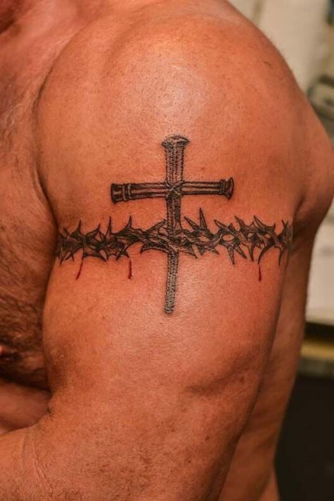 10 Mind-blowing crown of thorns tattoos Armband Tattoos For Men, Model Tattoo, Cross Tattoo For Men, Cross Tattoos, Tattoo Trend, Cross Tattoo Designs, Bicep Tattoo, Feather Tattoos, Cross Tattoo