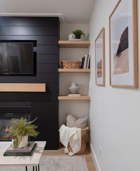 Fireplace And Floating Shelves, Dorm Room Shelves, Black Fireplace Wall, Modern Fireplace Design, Havenly Living Room, Floating Fireplace, Living Room Fireplace, Oak Floating Shelves, Black Accent Walls