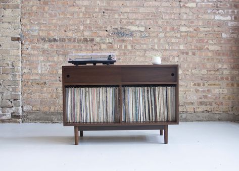 Mid Century Inspired walnut lp vinyl storage with sliding doors. Entertainment / media credenza with room for you record player, amp, receiver, and album collection. Handmade in Chicago. Lp Storage Cabinet, Mid Century Modern Storage, Media Credenza, Record Storage Cabinet, Media Consoles, Lp Storage, Album Collection, Record Cabinet, Modern Storage Cabinet