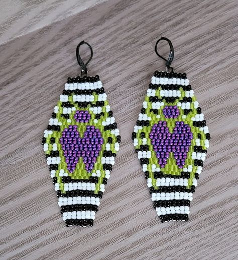 Thank you for taking the time to check out my shop! My family and I really appreciate it! These coffin shaped Beetlejuice earrings were designed and hand stitched together by me with glass seed beads and thread. These fun and spooky earrings are lightweight and easy to wear. Thanks again for stopping by! Have a great day! Crescent Moon Seed Bead Earrings, Beaded Coffin Earrings, Beetle Juice Earrings, Nightmare Before Christmas Beaded Earrings, Beetlejuice Jewelry Diy, Beetlejuice Beaded Earrings, Disney Beaded Earrings, Beaded Ghost Earrings, Halloween Seed Bead Earrings