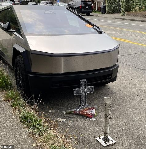 Abandoned $82,000 Cybertruck in busy street becomes tourist attraction with makeshift memorials | Daily Mail Online Seattle In September, Truck Hitch, Spacex Starship, Tesla Cybertruck, Fake Stone, What Kind Of Dog, Car Guide, Busy Street, Rear End