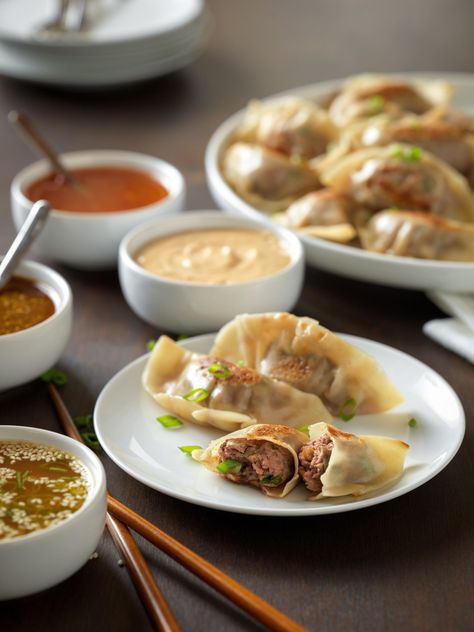 Beef Pot Stickers with Dipping Sauces. Check out this recipe and more Texas Favorites at the new beeflovingtexans.com Wonton Wrapper Recipes Ground Beef, Chinese Pot, Dumpling Recipes, Beef Dumplings, Chinese Beef, Cut Recipe, Peanut Dipping Sauces, Wonton Recipes, Mapo Tofu