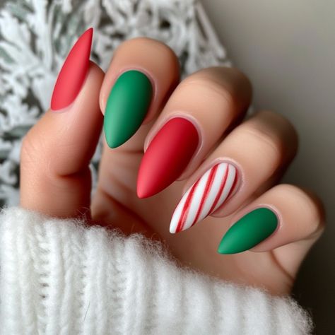 40 Trendy Red Christmas Nails That Will Make You Stand Out Christmas Nails Coffin Shape Green, Green Nails Red Tips, Christmas Nails Red Green And White, Red And Green Matte Nails, Christmas Nails Simple Green And Red, Matt Red Christmas Nails, Pink Red And Green Christmas Nails, Christmas Nail Green And Red, Colorful Christmas Nail Designs