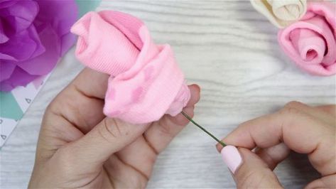 How to Make Flowers Out of Baby Socks: 14 Steps (with Pictures) Baby Shower Sock Bouquet, Baby Socks Flowers, Baby Socks Roses, Sock Bouquet, Used Socks, Baby Sock Corsage, Baby Sock Bouquet, How To Make Socks, Easter Saturday