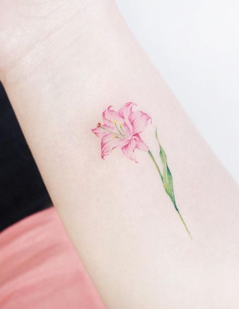 Small Tattoo by Tattooist IDA Colourful Flower Tattoo, Small Lily Tattoo, Ladies Tattoos, Coloured Tattoos, Best Flower Tattoos, Lilly Flower Tattoo, Stargazer Lily Tattoo, Flower Tats, Tiger Lily Tattoos