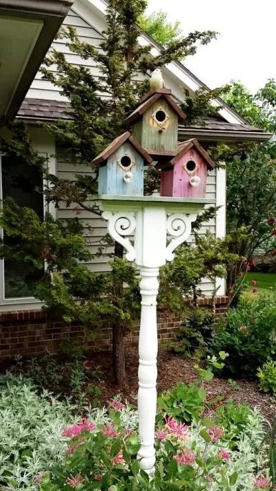 Sandra Hogan painted these birdhouses Birdhouses On Posts, Multiple Birdhouses On A Post, Birdhouse Condo Ideas, Birdhouse Painting Ideas, Birdhouse On A Pole, Bird House Painting Ideas Aesthetic, Birdhouse Neighborhood, Birdhouse Pole, Fundraiser Prizes