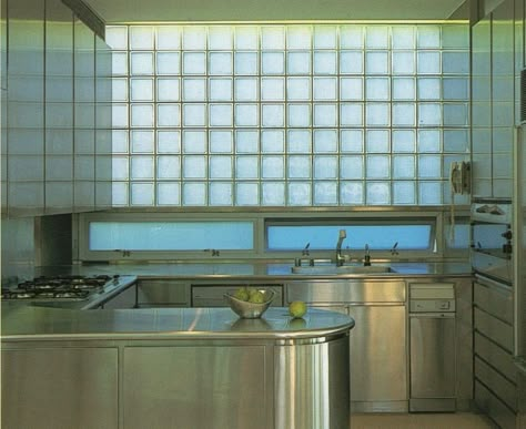 Lisa Jones on Instagram: “1990's stainless steel kitchen - "The Los Angeles House", Tim Street-Porter, via @arsin_et_bieuville” Glass Block Wall, 90s Interior, Los Angeles House, 80s Interior, Liminal Space, Glass Block, Block Wall, Los Angeles Homes, Glass Blocks