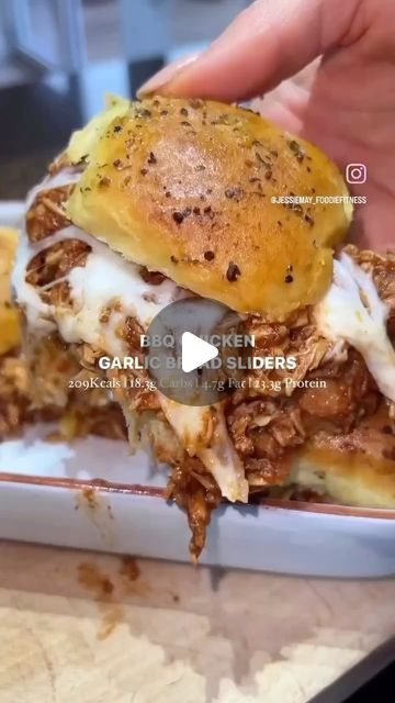 Tasty Tales Haven | Food Page on Instagram: "BBQ Pulled Chicken Garlic Bread Sliders! Imagine tender, smoky BBQ chicken layered on buttery garlic bread with melty cheese, all in one bite-sized slider! Perfect for parties, family dinners, or just because you’re craving a BBQ twist on your slider game. 🍞🧄🍗✨

418Kcals 46.7gprotein 36.7gcarbs 9.4gfat 

For 6 sliders ( we have 2 each so serves 3)

You’ll need:

450g chicken breast 

Sauce:
2tbsp bbq seasonng
1tbsp tomato puree 
1.5tbsp Worcestershire sauce
1tbsp honey 
2 garlic cloves, crushed 
1.5tbsp soy sauce
1.5tbsp balsamic vinegar
250g passata 

6 mini brioche sliders 
60g reduced fat mozzarella cheese, grated 
20g light butter, melted 
1tsp easy garlic 
1/2tsp mixed herbs 

1. Preheat your oven to 200 degrees Celsius. Place your chick Garlic Bread Sliders, Brioche Sliders, Chicken Garlic Bread, Chicken Breast Sauce, Bbq Pulled Chicken, Chicken Garlic, Tomato Puree, Melty Cheese, Pulled Chicken