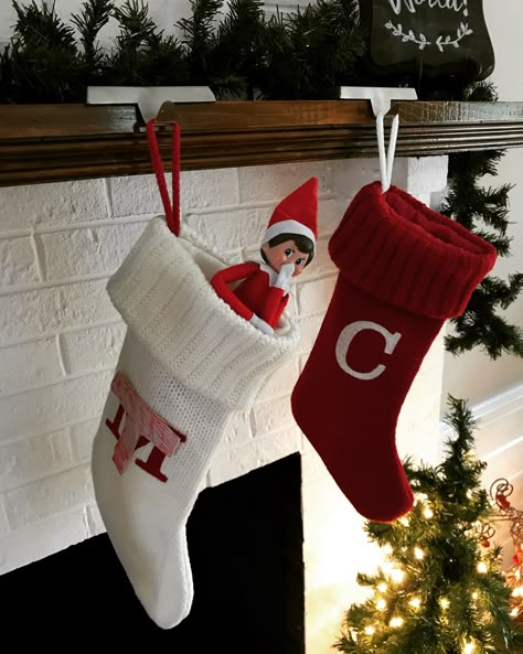 Trixie tried to steal a stocking #elfontheshelf Elf In Stocking Shelf Ideas, Elf On The Shelf Stocking Ideas, Elf In Stocking, Stocking Shelves, Elf Ideas Easy, Stocking Ideas, Elf Ideas, Shelf Ideas, On The Shelf