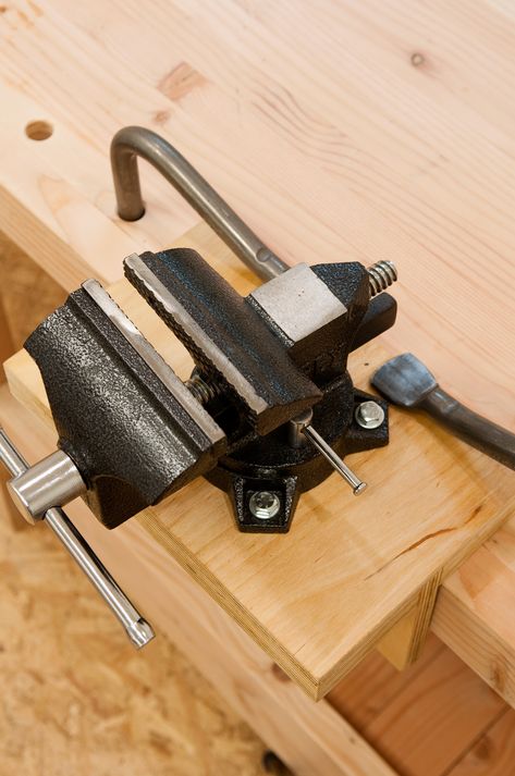 How to Install and Mount a Vise without Drilling Holes in Your Workbench | Man Made DIY | Crafts for Men Workbench Stool, Industrial Workbench, Workbench Designs, Bench Vice, House Owner, Woodworking Garage, Workbench Plans Diy, Bench Vise, Wood Crafting Tools