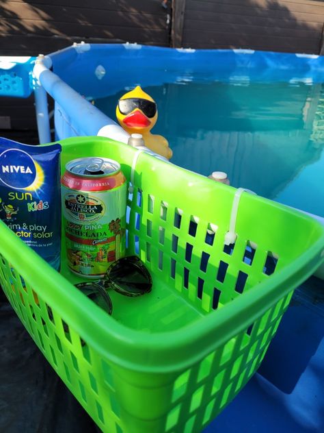 Dollar tree basket
Plastic zip ties
Cup and accessories holder by pool Diy Above Ground Pool Side Table, Diy Pool Cup Holder, Pool Shelf Ideas, Diy Poolside Table, Dollar Store Pool Hacks, Diy Above Ground Pool Accessories, Diy Pool Ideas Above Ground, Above Ground Pool Table Diy, Diy Pool Side Table