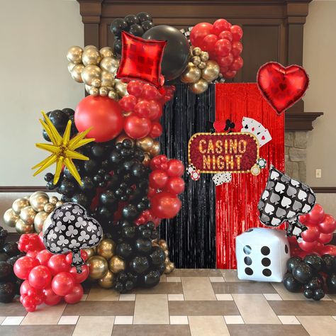 PRICES MAY VARY. **Ultimate Casino Theme Party Decorations**: Elevate your party with this deluxe set: 48 sleek black balloon (18inch*1, 10inch*20, 5inch*27), 48 vibrant red balloon (18inch*1, 10inch*20, 5inch*27), 47 shimmering metallic gold balloons (10inch*20, 5inch*27), 1 starburst balloon (22"), 4 casino poker balloons, 1 dice balloon, 2 foil curtain backdrops (1x2m each in red and black), glue dots*100, and 1 ribbon. **Casino Party Decorations**: Perfect for a wide range of celebrations in Red Gold Balloon Garland, Casino Royale Theme Party, Black Gold Party Decorations, Starburst Balloon, Vegas Prom, Casino Theme Party, Party Decorations Black, Auction Themes, Casino Birthday Party