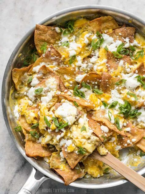 Green Chile Migas is a fast and inexpensive egg dish that is flavorful and filling any time of day, not just for breakfast! BudgetBytes.com Chilaquiles Recipe Mexican, Migas Recipe, Chilaquiles Recipe, Authentic Mexican Recipes, Mexican Breakfast Recipes, Budget Bytes, Egg Recipes For Breakfast, Egg Dish, Koh Tao