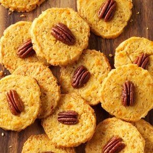 Cheddar-Pecan Crisps Recipe: How to Make It Cheese Crispies, Homemade Crackers Recipe, Cheese Straws, Homemade Crackers, Christmas Food Gifts, Crunchy Snack, Crisp Recipe, Cheese Crackers, Low Carb Snacks