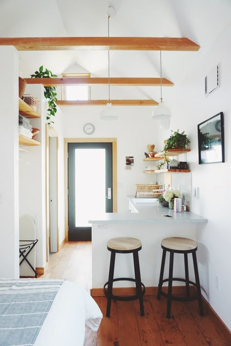 These barely there clear pendants would work.  Not distracting and keep it light and airy (especially for low ceilings...don't want anything pulling down an already low ceiling) Exposed beams in the Portland Tiny House Tiny House Inspiration, Tiny Cottage, Tiny Spaces, Tiny Kitchen, Tiny House Living, Kitchen Area, Small Homes, Small Houses, Tiny Living