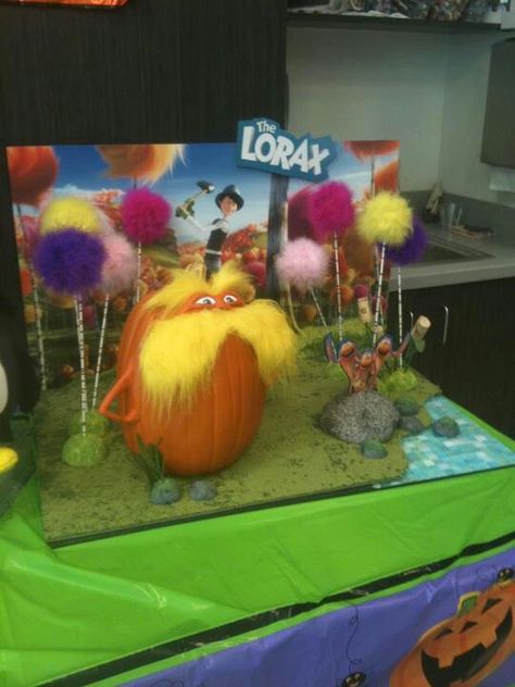 Pumpkin lorax Girly Pumpkin Decorating Ideas, Painted Pumpkins Based On Books, Pumpkin Decorating Movie Theme, Pumpkin Painting Ideas Book Theme, Dr Suess Pumpkins, Dr Suess Pumpkin Ideas, Crazy Pumpkin Painting Ideas, Disguised Pumpkin Project, Lorax Pumpkin Painting