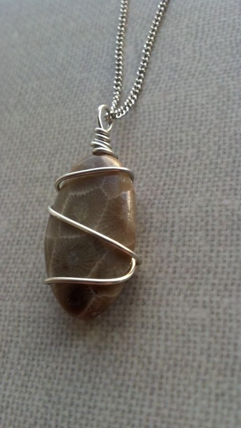 diy petoseky stone necklace | Petoskey Stone Necklace | DIY Rock Holder Necklace Diy, Diy Rock Necklace, Petoskey Stone Crafts, Rock Necklace Diy, Stone Necklace Diy, Petoskey Stone Jewelry, Petosky Stone, Jewelry Wrapping, Rock Diy