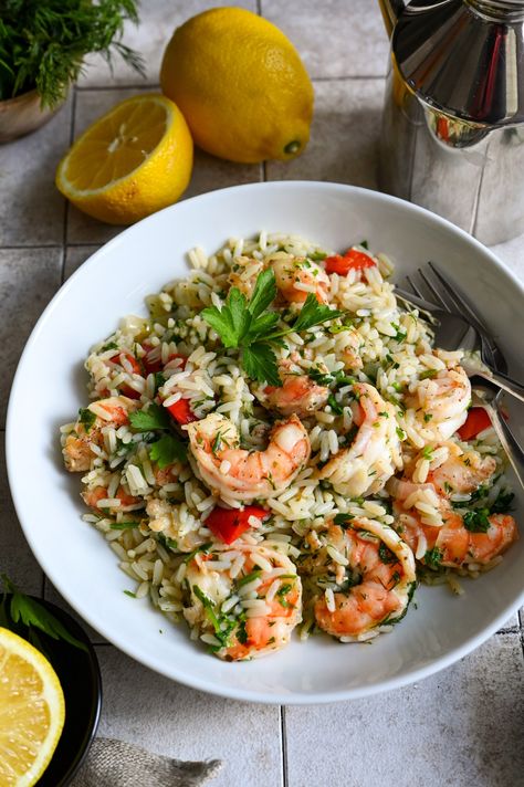 A one skillet meal of shrimp and rice full of vegetables and herbs. Shrimp And Rice Salad, Shrimp And White Rice Recipes Healthy, Healthy Shrimp Rice, Greek Shrimp And Rice, Shrimp Mediterranean Recipes, Shrimp N Rice Easy Recipes, Lemon Garlic Shrimp And Rice, Shrimp And Brown Rice Recipes Healthy, Shrimp And Rice Recipes