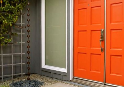 Add an unexpected splash of color on the front door for a bright, fun, warm and/or cool welcome home! Orange Front Door, Orange Brick Houses, Orange Front Doors, Yellow Front Doors, Front Porch Makeover, Orange Door, Beautiful Front Doors, Front Door Paint Colors, Asian Landscape