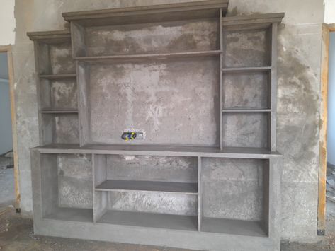 Cement Cabord Designs, Concrete Tv Wall Design, Cement Shelves Design In Kitchen, Tv Cubbords Design, Tv Unit Design Cement Work, Cement Tv Wall, Cement Cupboard Design, Hall Self Design With Cement, Tv Wall Design Cement Work