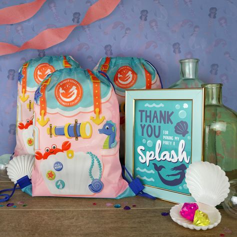 Mermaid Party favor bags with mermaid under the sea graphics. Under The Sea Party Favors Goody Bags, Under The Sea Party Favors, Sea Party Favors, Mermaid Party Favors Bags, Mermaid Pinata, Party Goodie Bags, Mermaid Favor, Under The Sea Decorations, Birthday Treat Bags