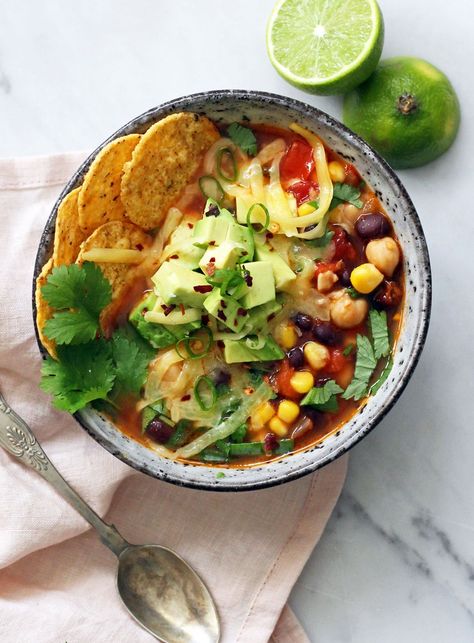 A bright and wholesome Mexican soup with handfuls of herbs, avocado and chilli. The broth is light and nourishing. I'm obsessed with this dish at the moment – it's just so simple to throw together. Leave it vegetarian or add some shredded chicken or grilled prawns. Soup With Black Beans, Soup With Beans, Mexican Tortilla Soup, Avocado Dishes, Grilled Prawns, Healthy Cook Books, Mexican Soup, Healthy Mexican, Healthier Eating