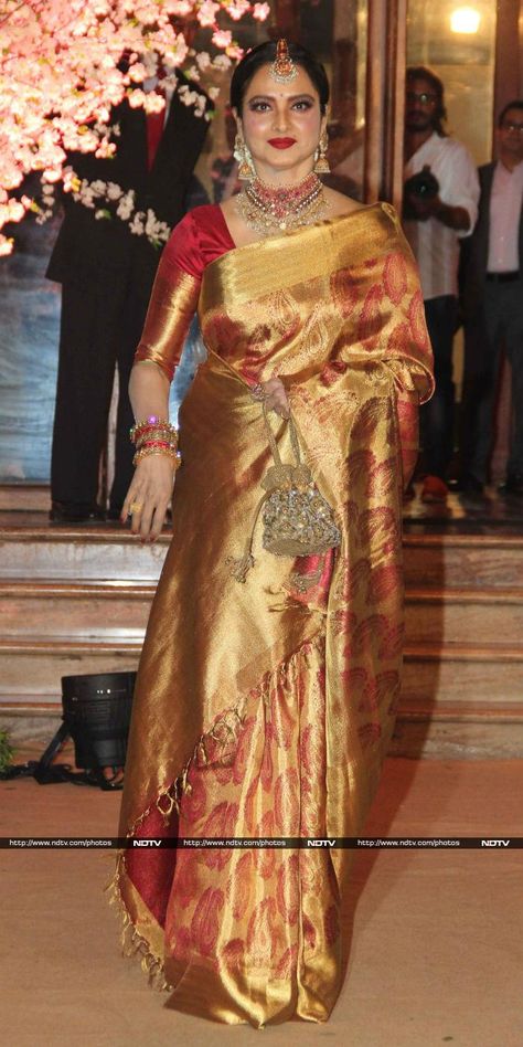 Actress Rekha, dressed in her usual kanjivaram sari, glittered at the do. Rekha 80s, Saree Celebrity, Rekha Saree, Rekha Actress, Southern Beauty, Kanjivaram Sari, Bollywood Designer Sarees, Golden Saree, Kanjivaram Sarees Silk