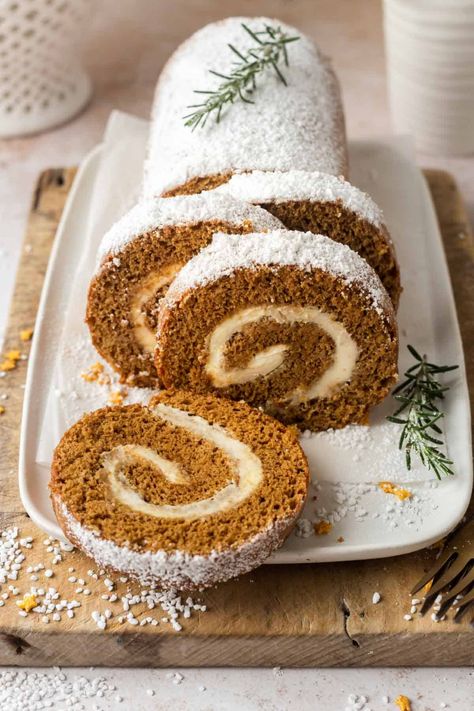 This Gingerbread Swiss Roll cake is both light, fluffy and packed full of ginger flavour. This simple, festive cake, filled with delicious cream cheese filling is perfect for the holiday season. By Emma Duckworth Bakes Pumpkin Rolls Recipe, Swiss Roll Cake, Cheese Pumpkin, Christmas Spices, Pumpkin Roll, Delicious Cream, Swiss Roll, Roll Cake, Cake Roll