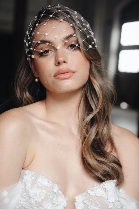 We've returned to the classics for our new collection of bridal accessories, featuring statement bows, delicate florals and timeless pearls. Birdcage Veil Hairstyle, Veil Hair Down, Birdcage Veil Wedding, Bridal Birdcage Veils, Wedding Birdcage, Tropical Sea, Bride Headpiece, Birdcage Veil, Sea Side