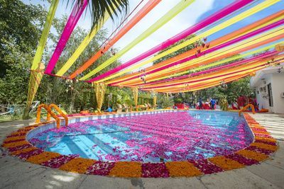 Stallion Events, Decor in Amritsar. Rated 5/5. View latest photos, read reviews and book online. Coachella Pool Party, Wedding Pool Party Decorations, Pool Wedding Decorations, Haldi Decoration Ideas, Pink Curtain, Wedding Pool Party, Poolside Decor, Modern Indian Wedding, Vibrant Decor