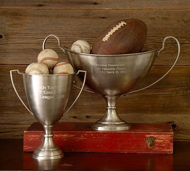 Stylish Vintage football trophies for storage from Pottery Barn Vintage Sports Party, Vintage Game Room Decor, Vintage Trophies, Vintage Sports Decor, Green Wellies, Sports Centerpieces, Old Trophies, Vintage Trophy, Football Rooms