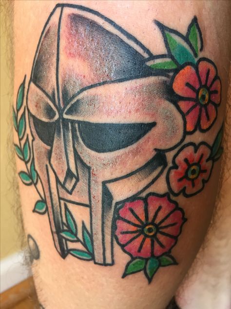 Mf doom tattoo traditional flowers Doom Tattoo Ideas, Mf Doom Tattoo, Doom Tattoo, Symbol Ideas, Traditional Flowers, Skin Drawing, Tattoo Traditional, Mf Doom, Music Tattoo