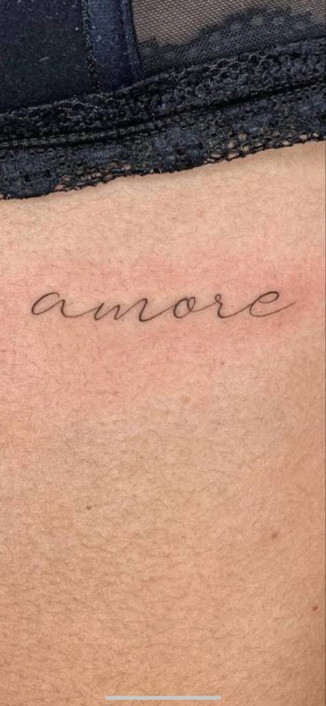 Amore Tattoo Cursive, Amour Tattoo Words Fonts, Amore Script Tattoo, I Love You In Italian Tattoo, Amore Tattoos For Women, Amor Word Tattoo, Italian Minimalist Tattoo, Small Spanish Tattoos For Women, Amore Tattoo Italian