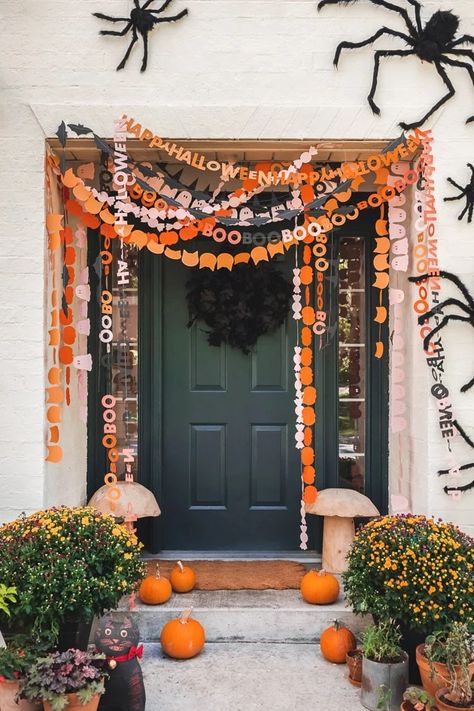 Easy Halloween Garland, Over The Top Halloween Decor, Cutesy Halloween Decor, Halloween Apartment Door Decor, 90s Halloween Decorations, Easy Halloween Party Decorations, Spider Web Garland, Colorful Halloween Decor, Outdoor Halloween Crafts