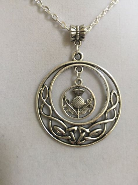 Silver Celtic design and Scottish thistle pendant Character Planning, Scottish Tattoos, Thistle Jewellery, Scottish Jewelry, Scottish Jewellery, Layering Necklaces, Celtic Design, Scottish Thistle, Celtic Designs