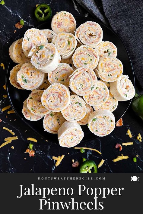 Turn simple ingredients into an amazing snack with this bacon jalapeno popper pinwheel recipe. Perfect for any party or get-together! Jalapeno Popper Pinwheels, Jalapeno Appetizer, Pinwheel Recipe, Bacon Jalapeno Poppers, Tortilla Rolls, How To Make Bacon, Roll Ups Tortilla, Stuffed Jalapenos With Bacon, Pinwheel Recipes