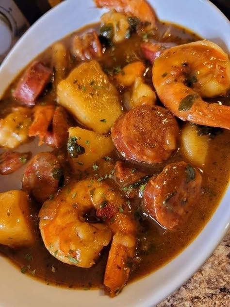 Indulge in the delicious combination of shrimp and sausage in this easy-to-make stew with potatoes and vegetables. Sausage And Potato Stew, Shrimp And Potatoes, Baking Potatoes, Shrimp And Sausage, Sausage Stew, Sausage Potato, Potato Stew, Shrimp Sausage, Sausage Potatoes