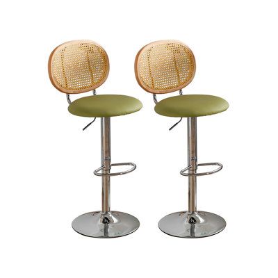 Revamp your bar or dining area with our contemporary bar stool, a stylish fusion of rattan, solid wood, and iron. This stool boasts a 360-degree swivel and adjustable height, offering a comfortable and versatile seating solution. Its sleek, rounded design and high-quality materials ensure both aesthetic appeal and practicality, making it a must-have for any modern setting. Orren Ellis Upholstery: Green | Orren Ellis Alvester Stool 17.72 W x 16.14 D in green / brownUpholstered / Metal | 17.72" W Bar Stool Ideas, Contemporary Bar Stool, Contemporary Bar Stools, Contemporary Bar, High Stool, White Minimalist, Kitchen Bar Stools, Round Design, Kitchen Dining Furniture