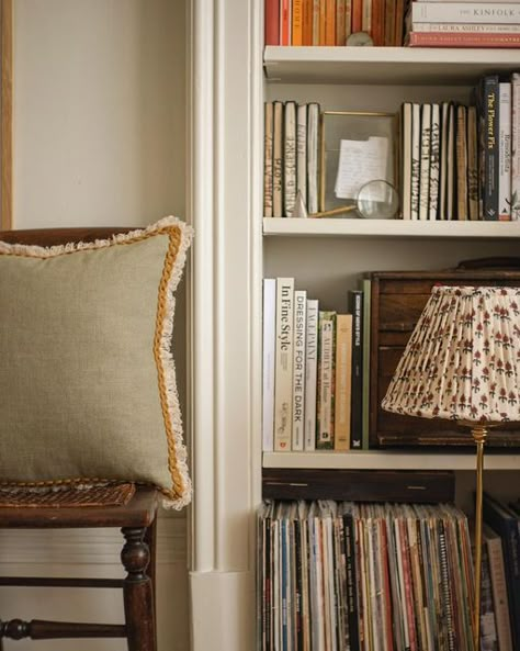 @amylorricon on Instagram: "Treated myself to a new cushion for the living room. It’ll eventually be for the chair we are in the process of reupholstering but for now, it looks lovely here, next to the books." Cottage Shelves Living Room, Office Dressing Room, Piano Library, Kathleen Kelly, Country Cottage Bedroom, Neutral House, House In Spain, Eclectic Room, Small Bedroom Inspiration