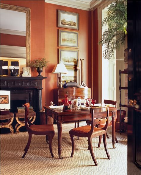 Gil Schafer's Greenwich Village living room is painted the same burnt orange color as he used at his country house. Coral Paint Colors, Gil Schafer, Warm Grey Paint Colors, Townhouse Apartments, Warm Color Schemes, American Houses, American House, Orange Decor, Grey Paint Colors