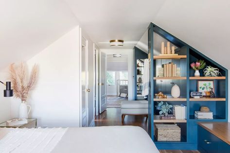 How to Decorate a Bedroom With Slanted Walls: 16 Tips and Ideas | Hunker Big Attic Ideas, Attic Alcove Ideas, Bonus Room Ideas Above Garage Bedrooms Master Suite, Attic Guest Suite, Attic Suite Bedrooms, Bungalow Bedroom Upstairs, Attic Master Suite Angled Ceilings, Attic Bedroom Ideas Master, Cozy Attic Bedroom