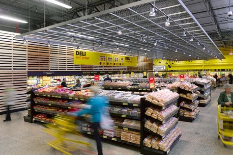 No frills by Landini Associates Hypermarket Design, Supermarket Signage, Supermarket Interior, Supermarket Design Interior, Retail Architecture, Open Ceiling, Supermarket Design, Retail Store Interior, Super Market