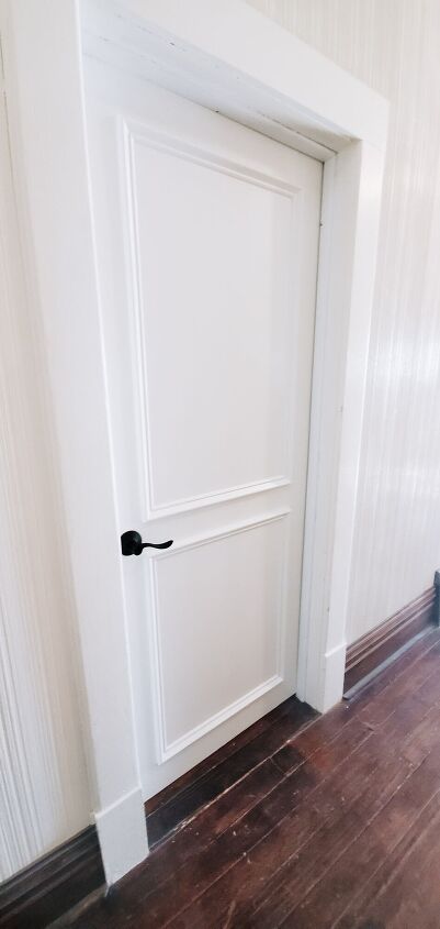 Shoe Molding Around Door Frame, Add Moulding To Doors, Adding Detail To Plain Doors, Trim On Interior Doors, White Molding Wood Doors, Adding Trim To Flat Doors, Room Door Frame Design, Internal Door Makeover, Picture Frame Molding Door