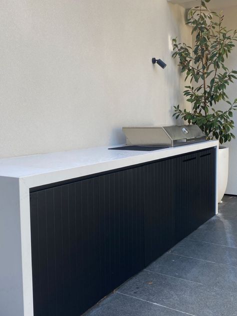 Caeser stone outdoorblack joineryBBQ Modern Garden Bar Ideas, Modern Bbq Design, Build In Bbq Outdoor, Bbq Area Ideas Outdoor Modern, Modern Bbq Area Outdoor, Outdoor Barbeque Ideas, Built In Bbq On Deck, Built In Bbq Ideas Outdoor Barbeque, Grill Ideas Backyard