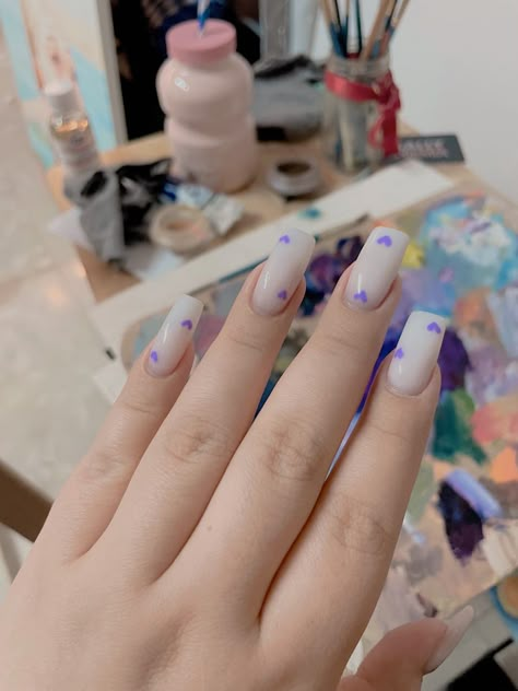 White acrylic nails with Purple Hearts Nail Inspo Purple And White, Nails White And Purple, White Purple Nails, Acrylic Nails With Purple, Purple Hearts Aesthetic, Purple Aesthetic Nails, White And Purple Nails, Purple Heart Nails, Purple And White Nails