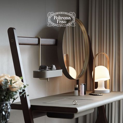 A corner to relax and treat yourself before going to bed. The Ren dressing table is part of a furniture accessory collection which is the result of studies by Neri & Hu for Poltrona Frau. It features a round mirror, an oval tray and a top with a lift-up compartment to store your beauty products. ​ Mirror Clothes, Neri Hu, Key Tray, Dressing Table Design, Poltrona Frau, Modern Entryway, Oval Tray, Clothes Rack, Study Table