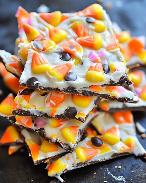 If you're looking for a festive and delicious treat to celebrate Halloween, this Easy Cookie Candy Corn Bark is perfect for you! This delightful candy bark combines sweet white chocolate Almond Bark Candy, Candy Corn Desserts, Candy Corn Bark, Carrot Cake Cheesecake Recipe, Candy Corn Recipe, Candy Corn Cookies, Carrot Cake Cheesecake, Easy Carrot Cake, Candy Bark